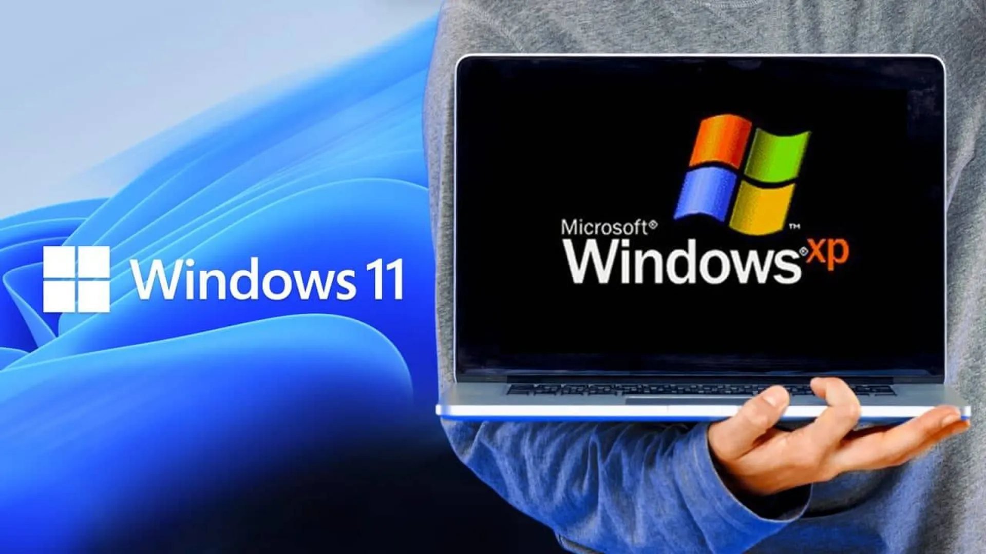 Человек держит ноутбук, на котором установлена Windows XP